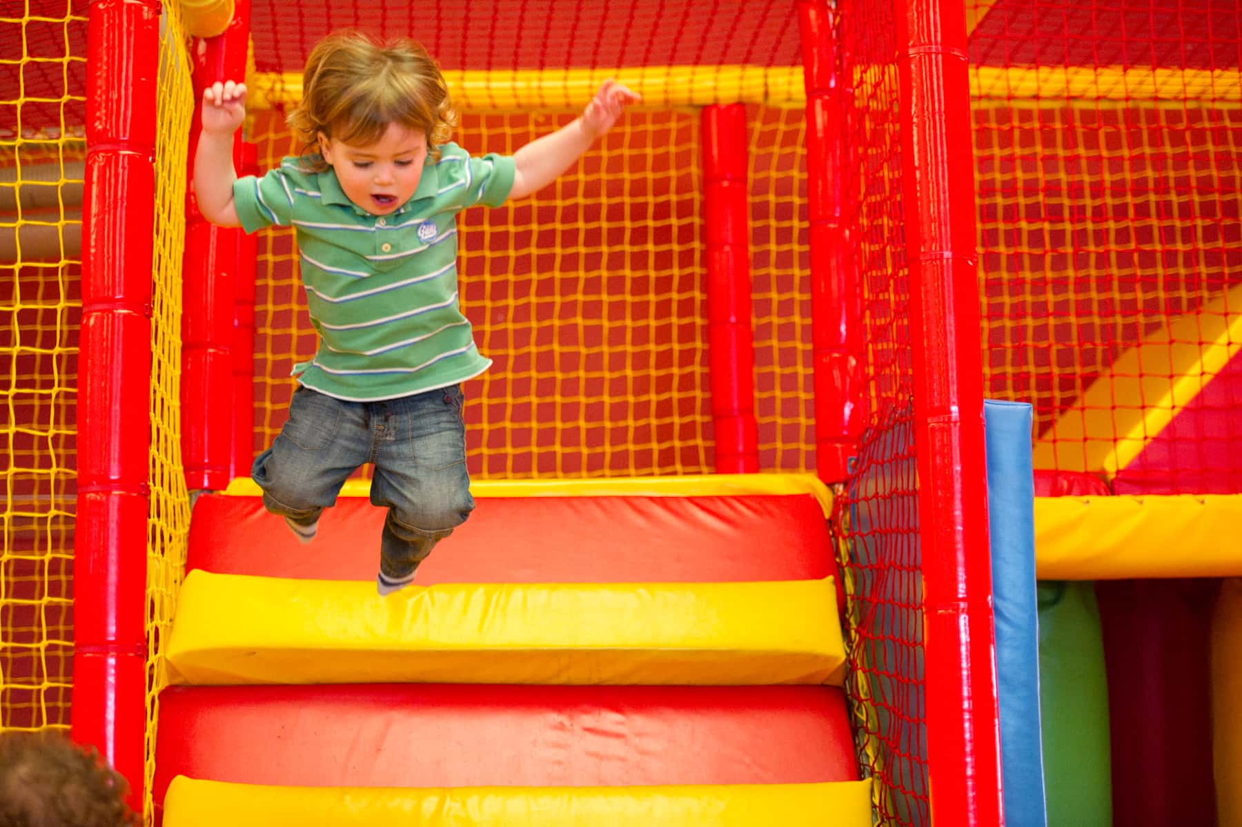 Kid Jumping In Play Area (1)(1)