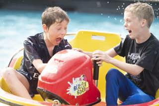 Two Boys On Blaster Boat