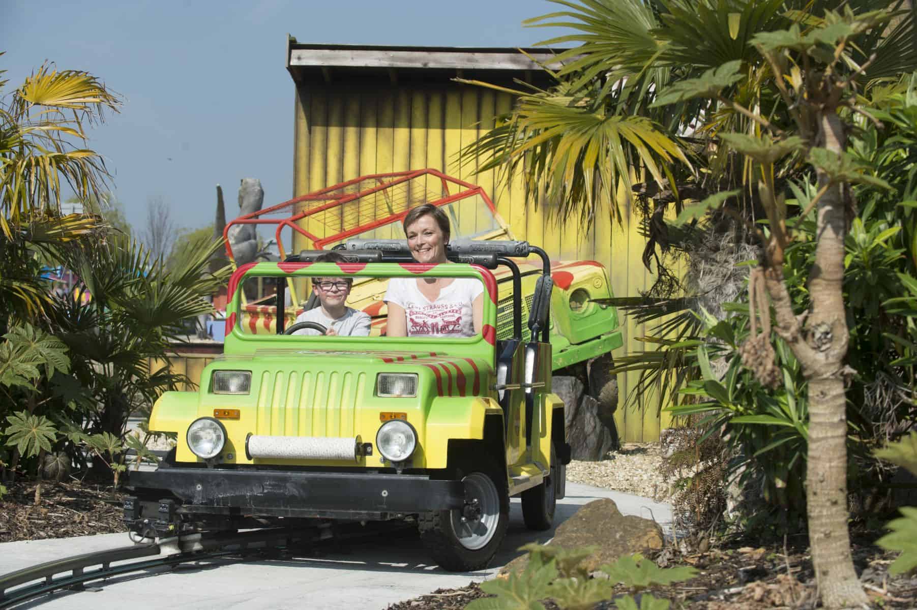 Mum And Son In Small Jeep